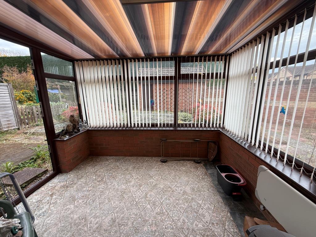 Lot: 102 - TWO-BEDROOM BUNGALOW IN NEED OF IMPROVEMENT - Brick built conservatory with windows all round